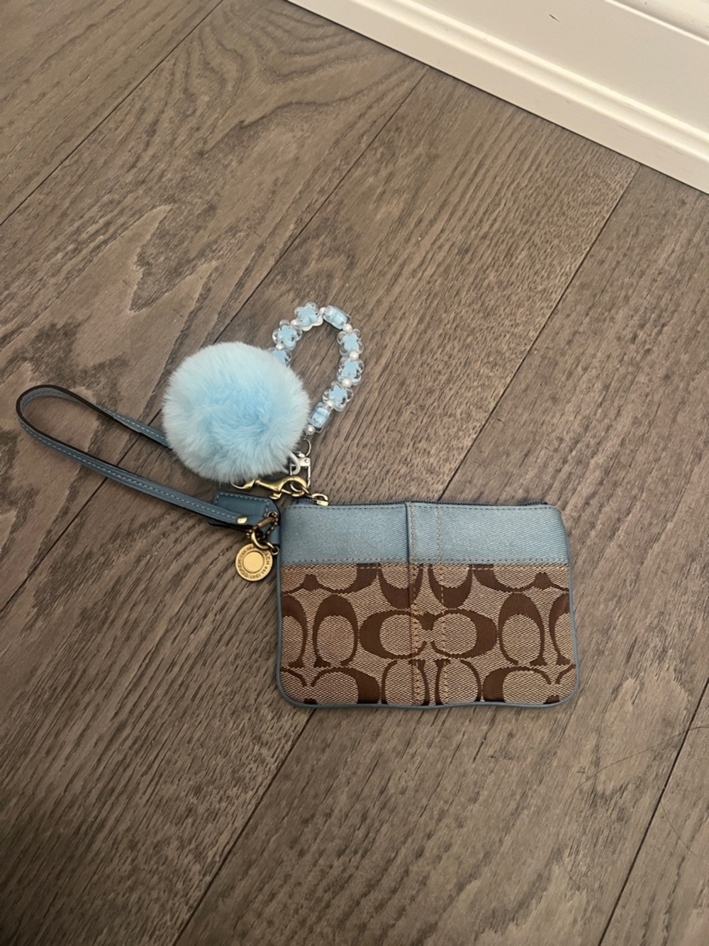 Coach Brown Signature Canvas Wristlet with Light Blue Trim and Pom - Picture 3 of 6
